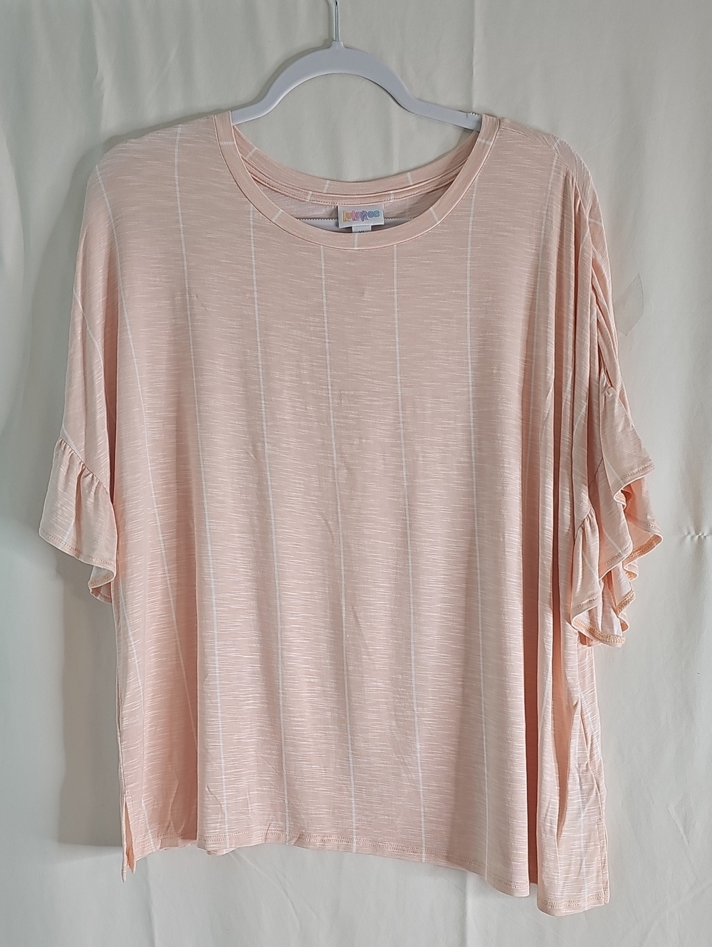 LuLaRoe DAHL Pale Blush Pink Short Sleeve Ruffle Top